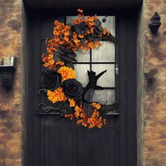 a black door with orange and yellow flowers on it