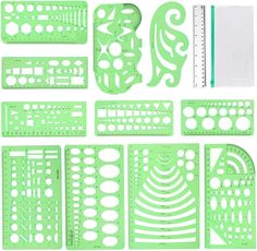 green paper cut outs and rulers with white circles on the top, bottom and bottom