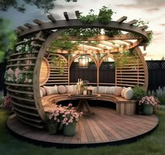 a wooden bench sitting on top of a lush green field next to a gazebo