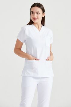 5 Reasons to Buy A Soft Anti-Wrinkle Terry Cotton Comfort Scrub Top Only From Super10MedPlus  Suitable for doctors, nurses, lab techs, pharmacists, veterinarians, students, physician assistants, nurse practitioners, surgeons, dentists, pathologists, pediatricians, obstetricians, radiologists, physical therapists, office managers, teachers, hygienists, aestheticians -- the list goes on. ❖ Affordable price ❖ Breathable, organic and top quality fabrics, only 100% Awesome ❖ Comfortable and light. It White Nurse Dress, Women Scrubs, Scrub Uniform, Nurse Dress, Nurse Dress Uniform, Basic Anatomy, White Scrubs, Medical Scrubs Outfit, Dental Scrubs