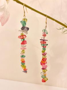 the earrings are made with multicolored glass beads