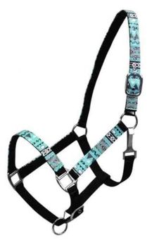 a blue and black halter with an intricate design on it's side,