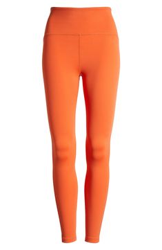 Sleek and stretchy fabric makes these high-waist leggings motion-friendly must-haves for the studio and beyond. 24" inseam; 7 1/2" leg opening; 11 3/4" front rise; 12 1/2" back rise (size Medium) Pull-on style 95% polyester, 5% elastane Machine wash, tumble dry Made in the USA of imported fabric Compression Clothing, Orange Retro, Orange Leggings, Sunset Orange, Cute Leggings, Beyond Yoga, High Waisted Leggings, Halloween Ideas, Stretchy Fabric