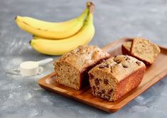 banana and chocolate chip muffins on a wooden plate