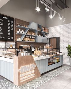 the inside of a restaurant with lots of food and drinks on display at the counter