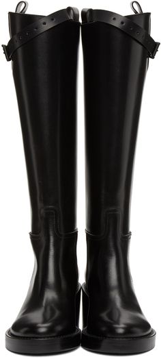 Knee-high panelled buffed leather tall boots in black. Zip closure at heel. Adjustable and detachable pin-buckle strap at collar. Leather lining. Tonal stacked block heel. Tonal leather sole. Tonal hardware. Approx. 2.75 heel. Supplier color: Black Fendi Clothing, Burberry Outfit, Boot Straps, Tall Leather Boots, Leather Block Heels, Ann Demeulemeester, Boots Knee, Tall Boots, Luxury Streetwear