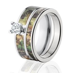 the camo wedding ring set is shown with a diamond