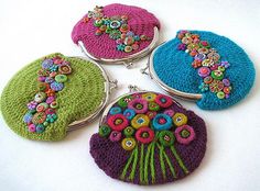 four purses with different designs on them sitting next to each other in the shape of flowers