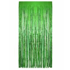 a green curtain hanging from the side of a wall with fringes on top of it