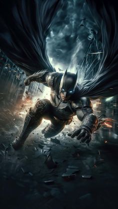 batman in the dark knight rises movie poster with his cape flying through the air,