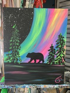 a painting of a bear in the woods with an aurora light behind it and trees