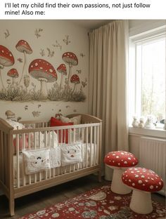 a baby's room with mushrooms painted on the wall, and a crib