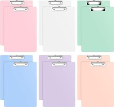 six clipboards in pastel colors are lined up and ready to be put together