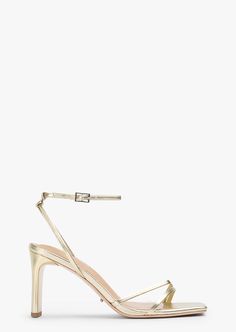 Complete your party look with our Corso strappy heels in gold nappa. Designed with slender foot-framing straps, an adjustable and secure ankle strap, and is finished with a mid-height stiletto heel. -Material: Leather Upper & Lining -Sole: Rubber -Fit: True to size -Toe-shape: Squared toe-shape -Heel: 8.5cm stiletto heel Thigh High Boots Flat, Embellished Heels, Heels Online, Metallic Shoes, Bridal Heels, Metallic Heels, Tony Bianco, Bow Heels, Low Boots