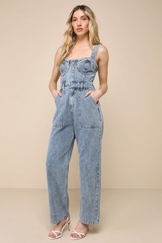 This spring will be full of admirers and compliments with a trendy look like the Lulus Fresh Perfection Light Wash Bustier Sleeveless Denim Jumpsuit! Slightly acid-washed 100% cotton denim shapes this too-cool jumpsuit that features a bustier-inspired bodice with seamed cups and a sweetheart neckline, supported by wide adjustable tank straps. A hidden snap button placket secures the front of the bodice, atop a banded waist with convenient belt loops and a hidden zip fly. The relaxed, straight pa Bustier Jumpsuit, Jumpsuit Denim, Black Strapless Jumpsuit, Denim Bustier, Lulu Pants, Chiffon Jumpsuit, Jumpsuit Blue, Two Piece Jumpsuit, Floral Print Rompers