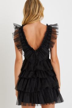 Everyone will be asking where you shop when you stroll into the party wearing the Lulus Striking Sensation Black Tulle Tiered Ruffled Mini Dress! Airy tulle overlays this iconic dress that has a sleeveless bodice with princess seams and a deep V-neckline (with a matching V-back). Skirt has a flirty tiered design with double layers of tulle, finishing at a mini hem. Hidden zipper/clasp at back. Fit: This garment fits true to size. Length: Mid-thigh. Size medium measures 34" from shoulder to hem. Hoco Dresses Aesthetic, Ruffle Tulle Dress, Hoco Ideas, Black Tulle Dress, White Lace Skater Dress, Black Sparkly Dress, Ruffled Mini Dress, Blue Skater Dress, Tulle Mini Dress