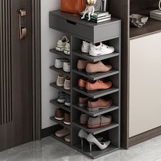 there is a shoe rack with many pairs of shoes on it