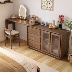 a bedroom with a bed, desk and chair next to a mirror on the wall