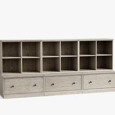 an open bookcase with drawers on each side and two doors at the bottom, against a white background