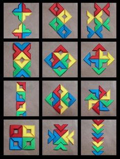 several different types of geometric shapes made out of colored construction paper, each with an arrow in the middle