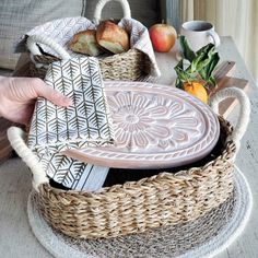 "[About This Handmade Bread Warmer] Looking for a unique and handmade gift for a baker or home entertainer? Check out this bread and tortilla warmer set from Gift Shop BY KORISSA! The set includes a ceramic stone for warming bread and tortillas, and a wicker woven basket. This set makes for a great hostess gift, new home gift, housewarming gift, wedding gift, newlywed gift, anniversary gift, mom birthday gift, or gift for her or him. Perfect for anyone who loves to bake or entertain at home! 🎁 For Add-On Personalized Wooden Gift Tag Options for Gift Box, Click the link below.  https://www.etsy.com/listing/1550716620/personalized-wooden-gift-tag-add-on-gift Our terracotta plate has been engraved with a flower design and cut to fit neatly into a wicker basket. This special bread warmer is n Terracotta Plate, Bread Warmer, Screen Print Tea Towels, Handmade Bread, Oval Basket, Tortilla Warmer, Seagrass Basket, Printed Tea Towel, Basket Gift