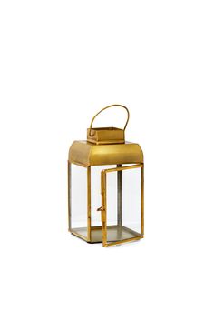 a gold colored lantern on a white background