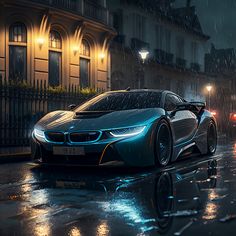 a blue sports car driving down a rain soaked street in the city at night with its lights on