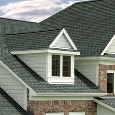 the roof of a house with two windows