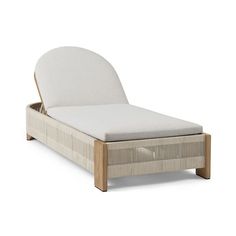 the bed frame is made from wood and has a white mattress on top of it