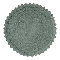 three round rugs in grey on a white background