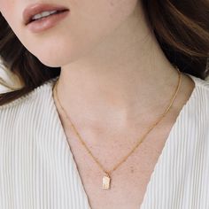 No matter where you are going, deck your neck with our classic Madeline rectangle two initial pendant. We love its modern design and versatility. Rock it alone or as the base of an on-trend layered look. 1/2" x 1/4" gold filled or sterling silver tag Hand stamped initial 16" brass satellite chain with 2" extender Lobster claw closure With customization this item is FINAL SALE NOTE - discs DO NOT slide on and off the chain. If you are looking to add or remove discs from the chain, the jump ring w Tennis Jewelry, Initial Pendant, Slide On, Monogram Initials, Personalized Necklace, Birthstone Jewelry, Turquoise Jewelry, Initial Necklace, Lobster Claw