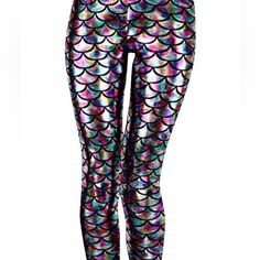 the leggings are colorful and shiny, with fish scales on it's sides