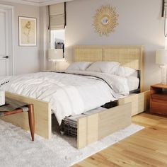 a bed with white sheets and pillows in a bedroom next to two nightstands on either side of the bed