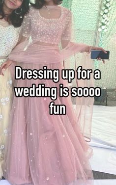 two women standing next to each other with text reading dressing up for a wedding is sooo