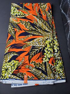 DESCRIPTION Orange and Yellow Multicolor African Ankara Fabric. This is high quality African print is 100% cotton and it's 45 inches wide. It is used for making African Clothing, African quilts, & For Home decoration. FYI: Print is Double sided. The listing is for Per yard, 6yards and Headwrap For Each piece of fabric measures: 34-36in by 45in for 1yard 105-108in by 45in for 3yards 210-216in by 45in for 6yards 70in by 22in for Head wrap If you purchase more than one yard, you will receive one co African Quilts, Clean And Press, Head Wrap Headband, Ankara Print, African Ankara, Fabric Headbands, Ankara Fabric, Orange And Yellow, Mixing Fabrics