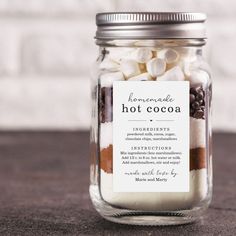 a jar filled with marshmallows and hot cocoa