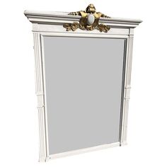 an ornate white and gold framed mirror on the wall, with a lion head at the top