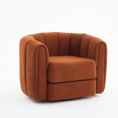 an orange chair sitting on top of a white floor