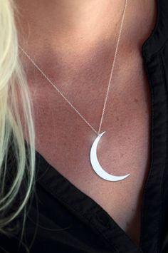 "Crescent Moon Necklace Product: Height: 1.5\" Tall 20 Gauge 18\" sterling silver chain This premium necklace is precision laser cut out of sterling silver (.925 silver). *If shopping around, please be sure to ask how each piece is produced. Many other products are made with CNC mills which are far less costly but are unable to produce the fine detail that comes from laser cut material* Shipping: Dependent on chosen shipping method. Please reach out with any questions you may have! See our shop Nature, Boho Jewellery, Bohemian Jewellery, Astronomy Necklace, Crescent Moon Necklace Gold, Crescent Necklace, Nature Necklace, Crescent Moon Necklace, Moon Necklace