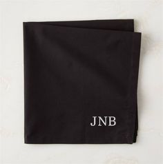 the j n b black pocket square is shown