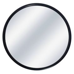 a round mirror on a white background with black trimming and an oval shape in the middle