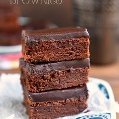 chocolate brownies stacked on top of each other