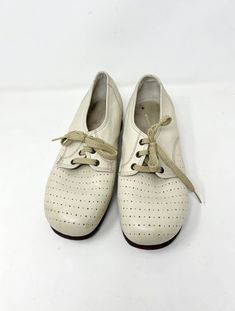 Vintage 1980s Perforated Platform Oxford Shoes / 8 leather uppers Length of footbed 9.75" Width 3" Leathers material, off white color, 1" heel In great condition. H4 Platform Oxford Shoes, Womens Clogs And Mules, Oxford Platform Shoes, Oxford Platform, Clogs And Mules, Clogs Shoes, Womens Clogs, Off White Color, White Color