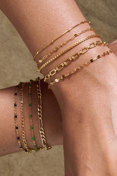 Everyone needs a simple chain that pairs well with every stack, and the Bennett bracelet is our go-to box chain. With a sleek shine that reflects from every angle, this piece is perfect for any minimalist who loves to stack. 14k Gold Fill Length: 6" + 1" ext Make your jewelry last! Click here for jewelry care. Need a gift box? We got you. Gold Link Bracelet Stack, Trendy Gold Link Bracelet, Tarnish Resistant, Gold 14k Gold-filled Stackable Chain Bracelet, Gold Bracelet Stack, Stackable 14k Gold-filled Bracelets, Adjustable Stackable 14k Gold-filled Stretch Bracelet, Figaro Necklace, Sparkle Bracelet, Sparkle Necklace