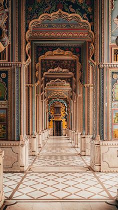 an intricately decorated hallway with paintings on the walls