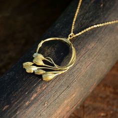 Birthday gift Gold twig pendant, Bohemian necklace, Brass banch necklace gold plated chain, Lapsana communis necklace, Botanical jewelry. This delicately woven Lapsana communis necklace was created on the basis of a natural branch. It is made of a good quality brass. The pendant is 3,8 cm (2.5 inches) long. The set includes a gold-plated sterling silver chain. You can choose the length of the chain. Each of them has a 5 cm (1.97 inches) extension. Available lengths: S: 40 cm - 15.75 inches  M: 50 cm - 19.69 inches L: 70 cm - 27.56 inches Your jewelry will arrive elegantly packaged within a charming gift box. Matching earrings available here: https://www.etsy.com/listing/1500633546/twig-hoop-earrings-branches-and-leaves A true masterpiece of nature-inspired jewelry. Handcrafted with precisi Plants Jewelry, Twig Jewelry, Gold Twigs, Rock Jewelry, Botanical Jewelry, Jewelry Lookbook, Bohemian Necklace, Nature Inspired Jewelry, Inspired Jewelry