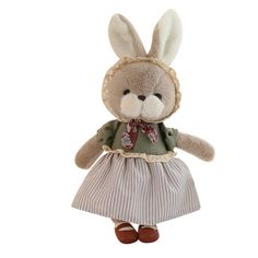 a stuffed rabbit wearing a dress and shoes