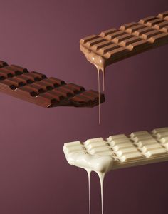 the chocolate bar is dripping from it's top and bottom, along with another one that appears to be melting