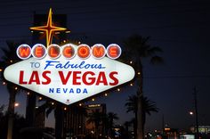 the welcome to fabulous las vegas sign lit up at night