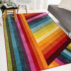 a multi colored rug in a living room